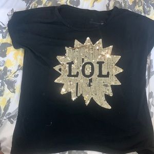 I’m selling a black T-Shirt for kids/teens, the age of 13-16